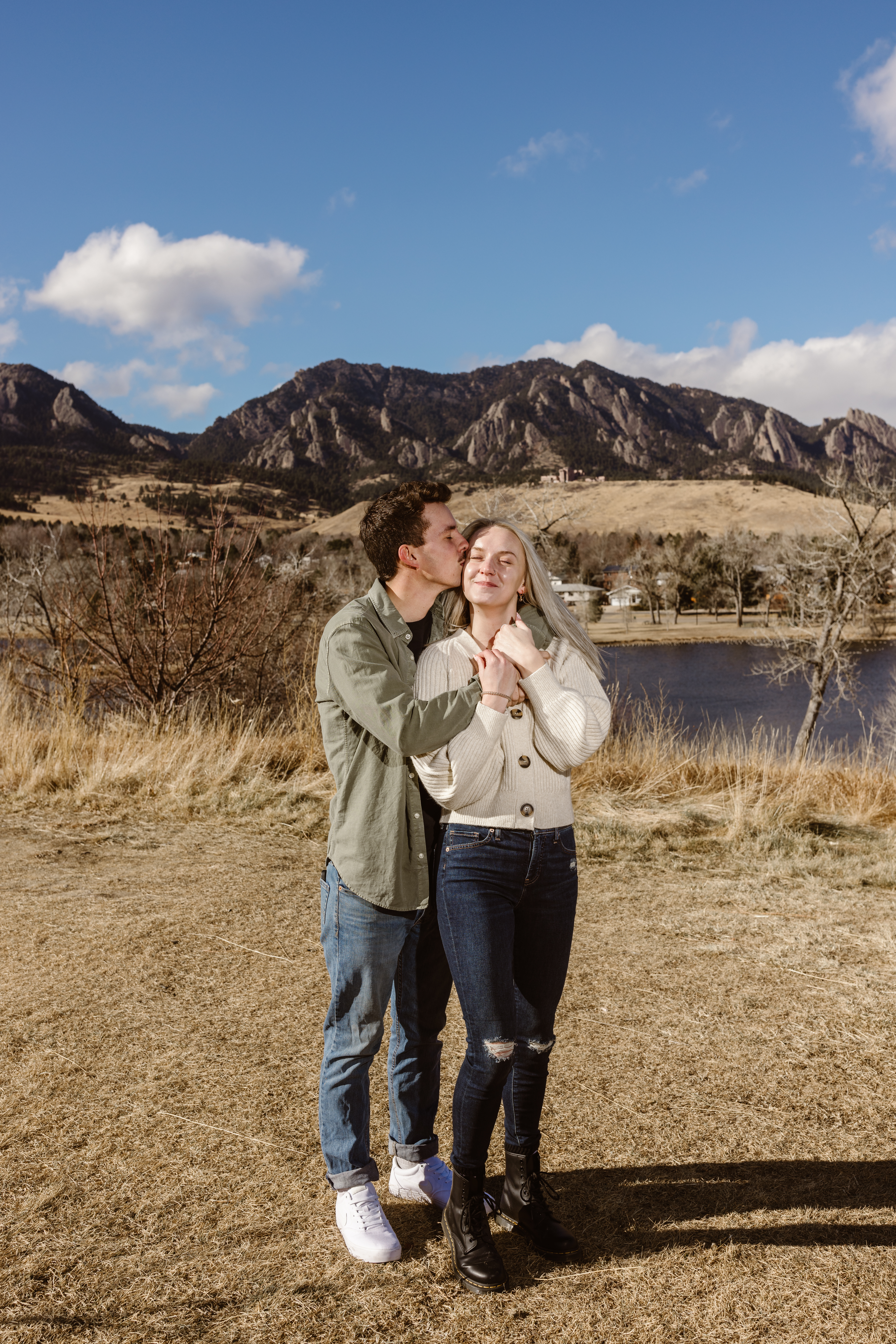 Couple photo with the Flatirons in the background