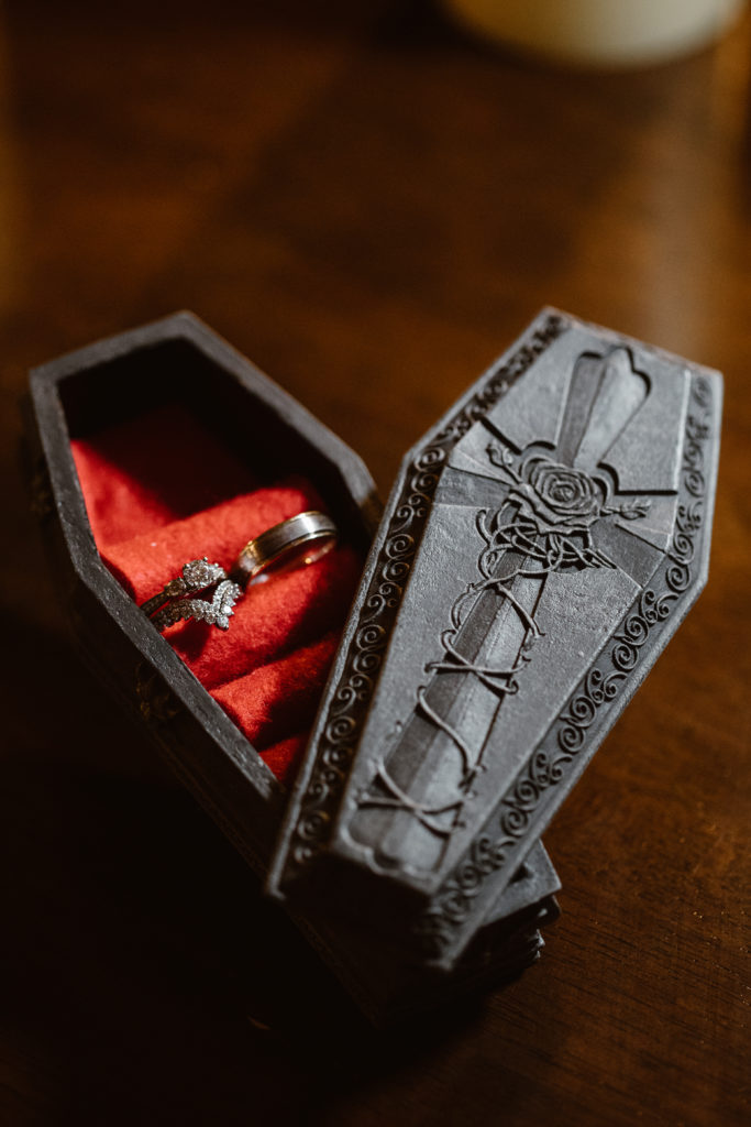Wedding rings in a coffin ring box.