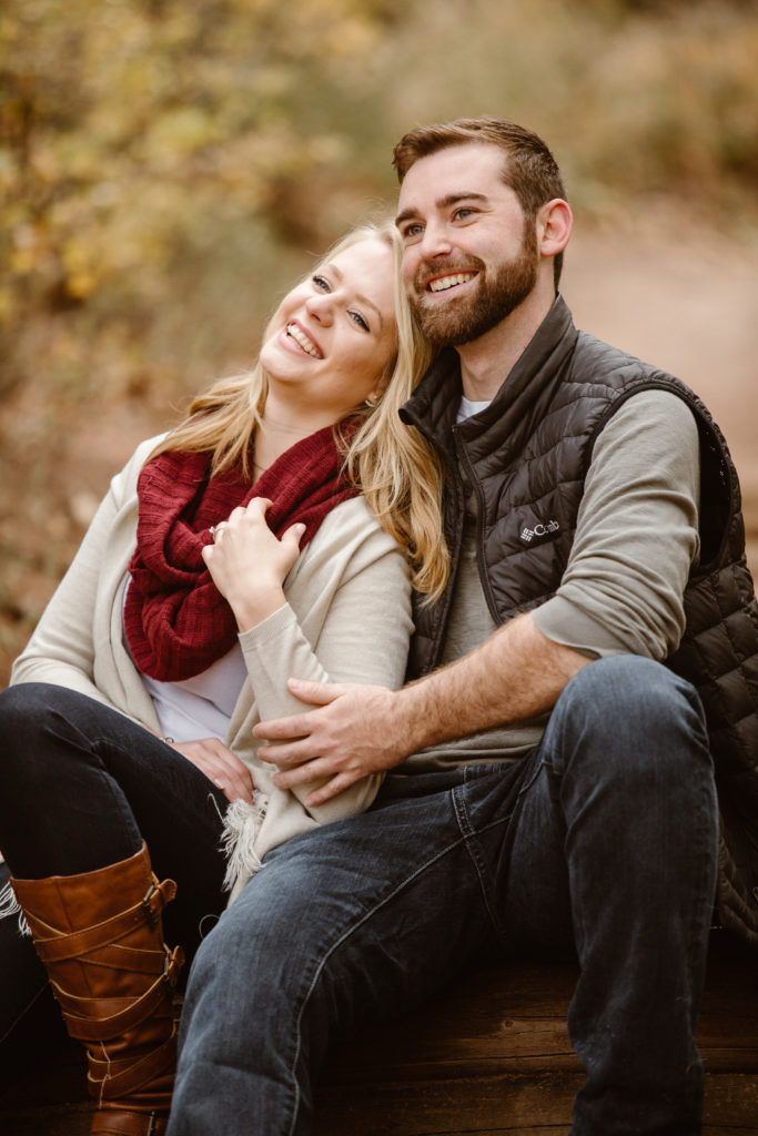 Couple with arms around each other, smiling