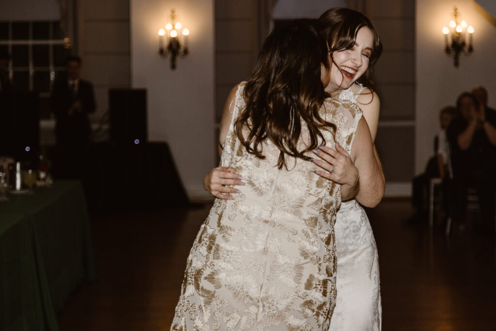 Bride hugging her mother during their mother, daughter dance