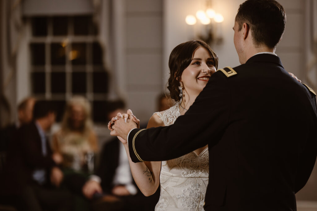 Bride looking at groom during their first dance as husband and wife