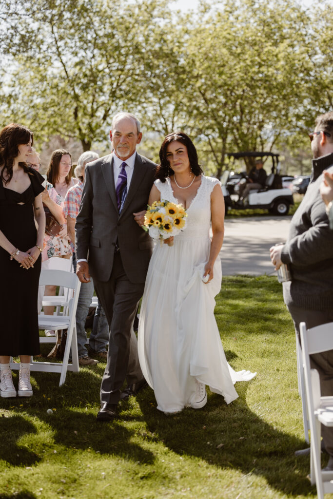 Bride walking down the aisle with her father