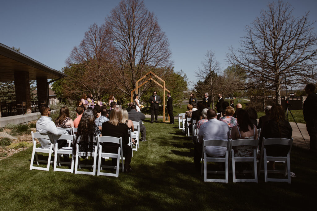 Large shot of the ceremony including the guests