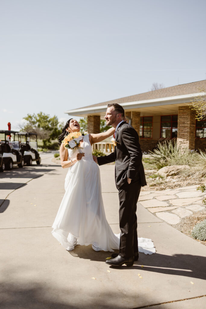 Bride and groom laughing together after wedding ceremony at Walnut Creek Golf Preserve