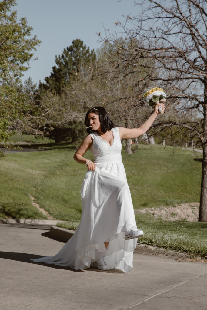 Bride smoking a joint and showing off her shoes